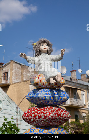 Statue avec enfant on pillow Banque D'Images