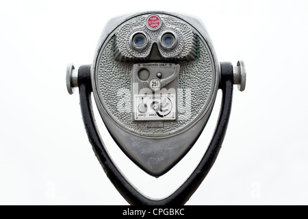 Jumelles à monnayeur sur blanc Banque D'Images
