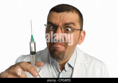 Doctor holding syringe, close-up Banque D'Images