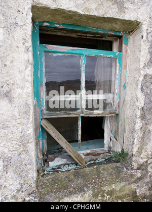 Fenêtre d'une maison inhabitée Croft, Isle Of Lewis Banque D'Images