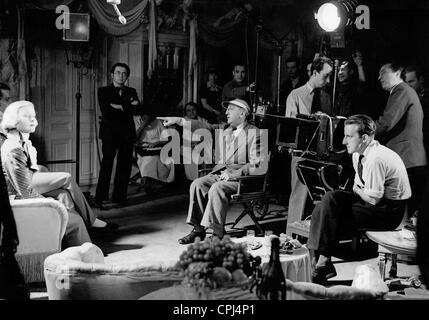 Lilian Harvey, Karl Ritter et Guenther Anders pendant le tournage de "Capriccio", 1938 Banque D'Images