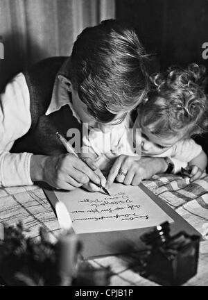 Enfant écrit une liste de souhaits, 1936 Banque D'Images