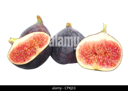 Couper les moitiés de figues fraîches et de fruits entiers isolated on white Banque D'Images