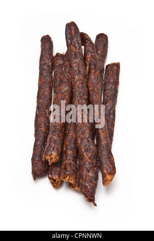 South African épicé Peri peri drywors (saucisson séché) isolated on a white background studio. Banque D'Images