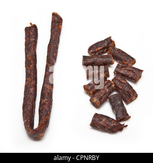 South African épicé Peri peri drywors (saucisson séché) isolated on a white background studio. Banque D'Images