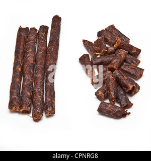 South African épicé Peri peri drywors (saucisson séché) isolated on a white background studio. Banque D'Images