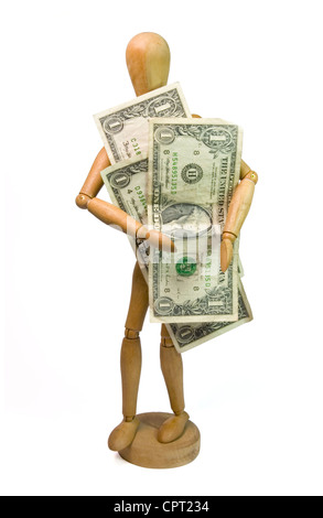 Dummie en bois stand holding 3 dollars de l'argent Banque D'Images