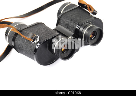 Closeup of old black binoculars isolated on white Banque D'Images