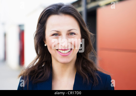 Close up de businesswomans smiling face Banque D'Images