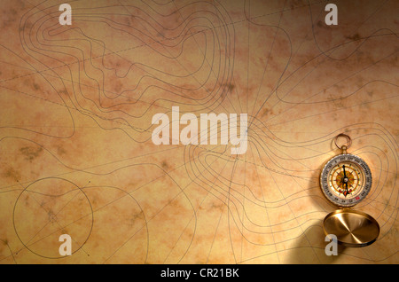 Vue rapprochée de la boussole sur l'ancien papier fond Banque D'Images