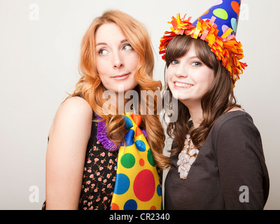 Studio Shot of young woman dressed in party hat Banque D'Images