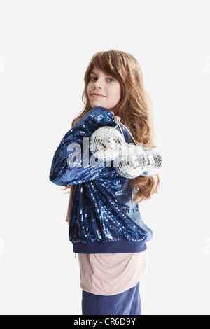 Fille avec boule disco, smiling, portrait Banque D'Images