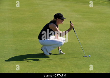 Chypre, woman on golf course Banque D'Images