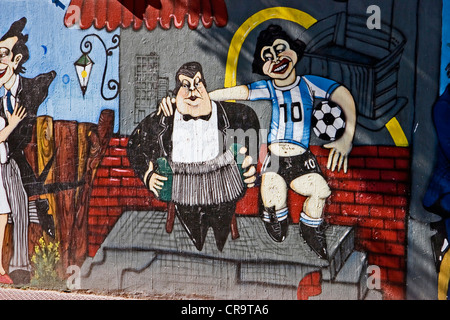 Une murale ( street art) de Diego Maradona dans le quartier de La Boca de Buenos Aires, Argentine. Banque D'Images