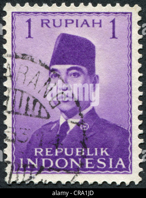 Indonésie - circa 1951 : timbre imprimé dans l'Indonésie, présente le premier président de l'Indonésie, Sukarno, vers 1951 Banque D'Images