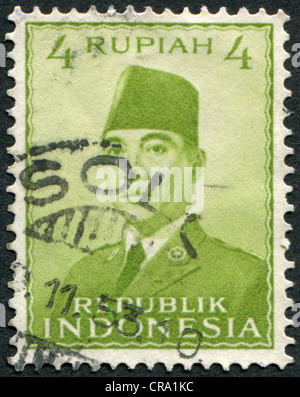 Indonésie - circa 1951 : timbre imprimé dans l'Indonésie, présente le premier président de l'Indonésie, Sukarno, vers 1951 Banque D'Images