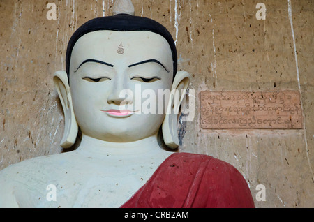 Le bouddhisme, Bouddha assis figure dans la pagode de Htilominlo temple du 13ème siècle, l'un des derniers grands temples construits Banque D'Images