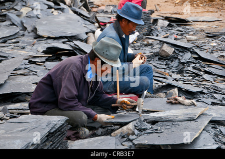 Briser les travailleurs des pierres, Temple Drepung, Lhassa, Tibet, Asie Banque D'Images