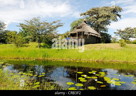 Chalets à Camp Kwando, lodge et camping sur la rivière Kwando, bande de Caprivi Strip, de l'Okavango ou la Namibie, l'Afrique Banque D'Images