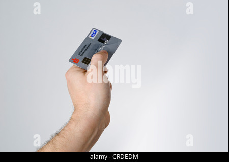 Hand holding bank card, carte de débit Banque D'Images