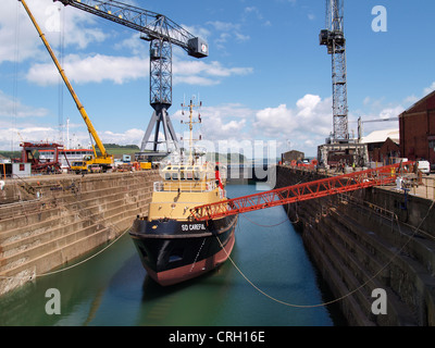 Tug boat Attention SD en Falmouth docks, Cornwall, UK Banque D'Images