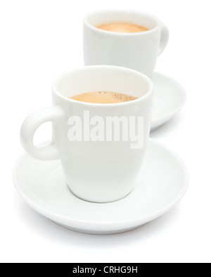 Deux tasses de café espresso blanc sur fond blanc Banque D'Images