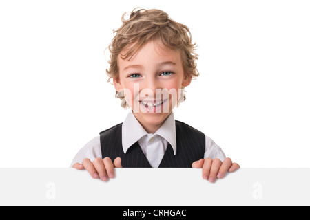 Portrait d'un garçon gay six ans dans le studio Banque D'Images