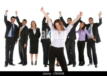 Young businesswoman standing in front of son équipe, encourageant avec les bras tendus Banque D'Images