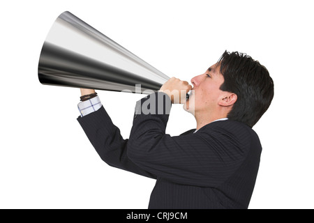 Businessman talking through a megaphone Banque D'Images