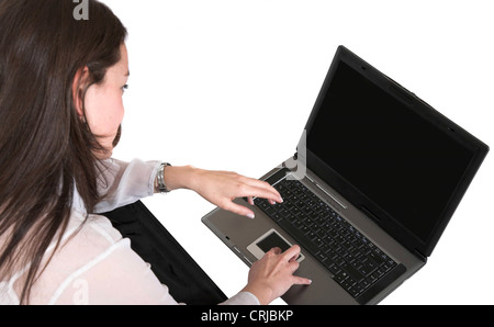 Business woman on laptop over white - focus sur le clavier Banque D'Images