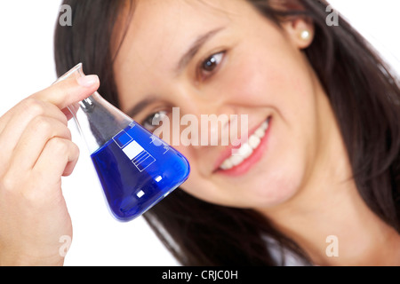 Femme fille dans un laboratoire tenant un tube à essai Banque D'Images