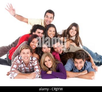 Happy friends avec leurs têtes ensemble sur le plancher isolé Banque D'Images