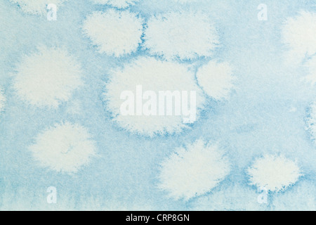 Abstrait bleu aquarelle peinte sur papier texturé Blanc Banque D'Images