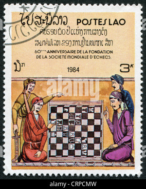 Un timbre imprimé dans le Laos, dédié à la 60 e anniversaire de la Fédération internationale des échecs Banque D'Images