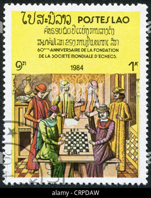 Un timbre imprimé dans le Laos, dédié à la 60 e anniversaire de la Fédération internationale des échecs. Banque D'Images