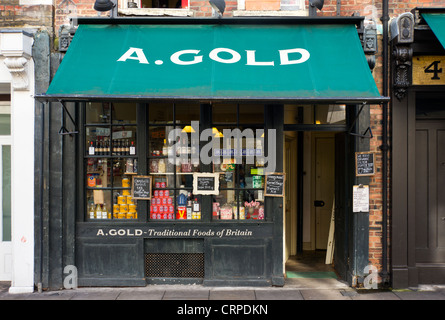 A. L'or, une cuisine britannique traditionnelle shop dans Brushfield Street dans l'East End de Londres. Banque D'Images