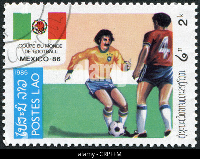 LAOS-VERS 1985 : timbre imprimé dans le Laos, est dédiée à la Coupe du Monde de la FIFA au Mexique, vers 1985 Banque D'Images