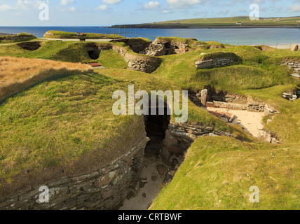 Les excavations d'anciennes habitations préhistoriques liées par des passages en village néolithique à Skara Brae Orkney Islands Scotland UK Banque D'Images