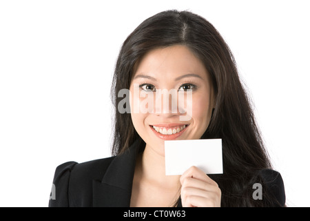 Asian Business woman holding an empty carte de visite. Banque D'Images