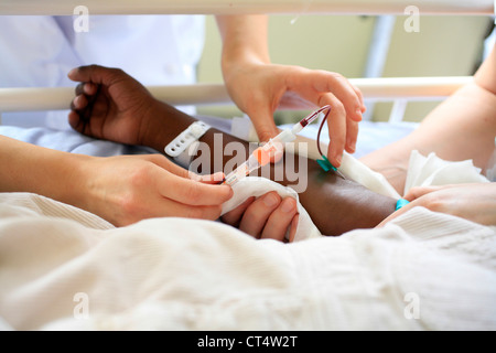 Les échantillons de sang chez un enfant Banque D'Images