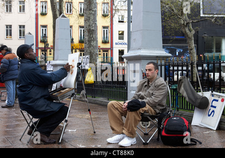 Londres - les artistes de rue représentent leurs clients Banque D'Images