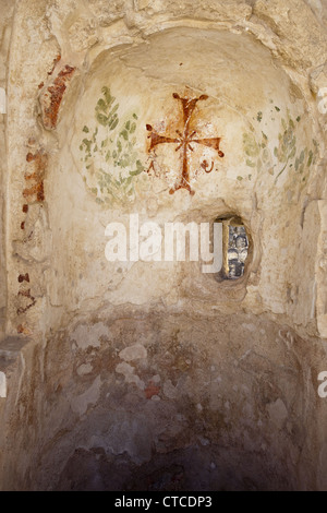 Croix Byzantine peinte sur un mur d'un ancien bain romain à Beit She'an Parc National, Israël Banque D'Images