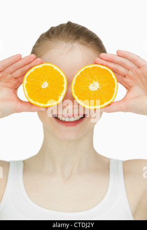 Close up of a woman mise sur ses yeux oranges Banque D'Images
