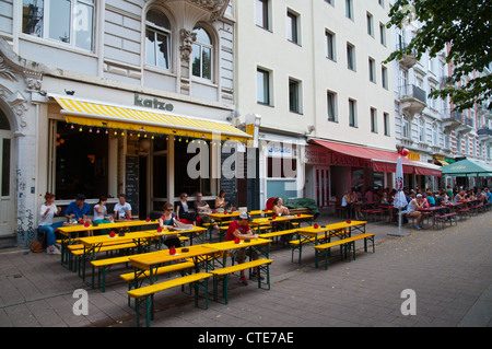 Restaurant terrasse le long de la rue Schulterblatt quartier Schanzenviertel Hambourg Allemagne Europe Banque D'Images