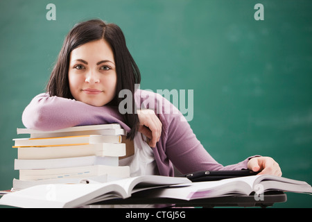 Caucasian student doing homework Banque D'Images