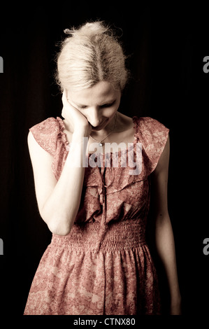 Femme à la triste Banque D'Images