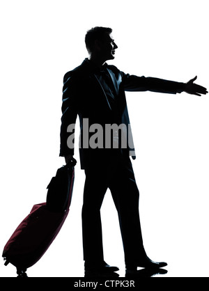 Un homme de race blanche un caucasian business traveler homme avec poignée de valise pleine longueur ossature en studio isolé sur fond blanc Banque D'Images