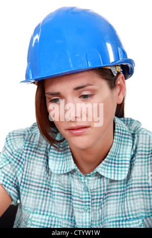 Triste femme builder Banque D'Images