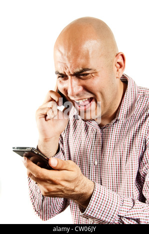 L'accent sur les jeunes adultes couple deux smartphone en même temps, regardant vraiment stressé et harcelé Banque D'Images