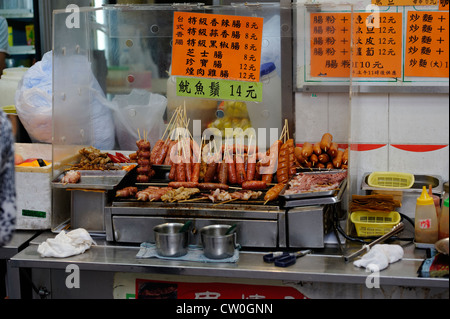 Blocage de hawker chinois vente fast food à Wan Chai, Hong Kong Banque D'Images